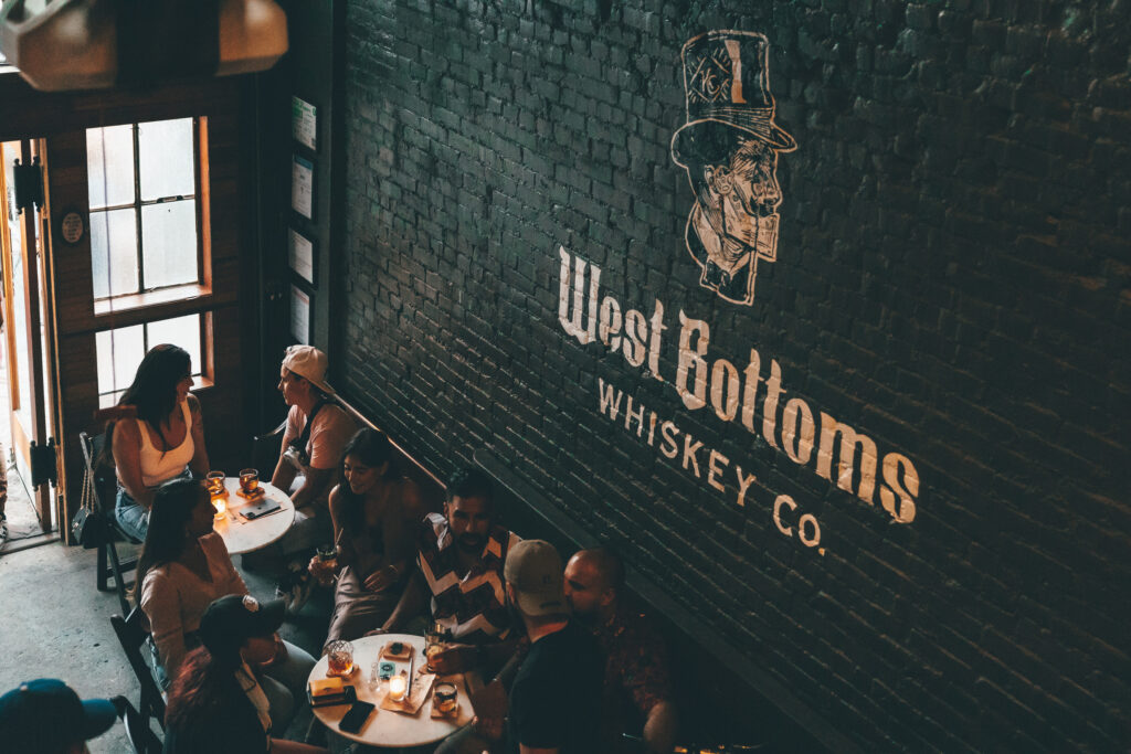 West Bottoms Whiskey Co. logo on wall