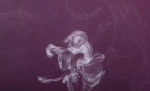 Smoke on a pinkish background image